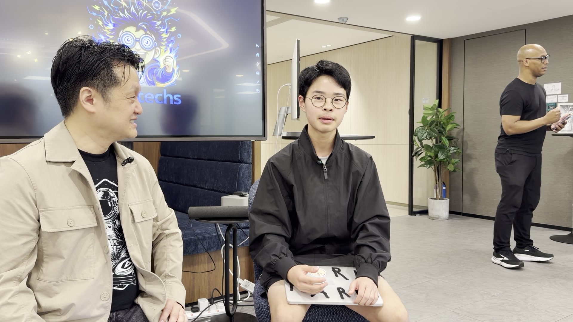 iPhone close-up of Matthew Chan